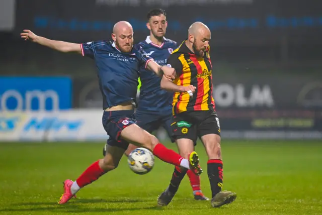 Partick Thistle's Stuart Bannigan and Raith Rovers' Zak Rudden in action during a cinch Premiership play-off semi-final first leg match between Partick Thistle and Raith Rovers at Wyre Stadium at Firhill, on May 14, 2024, in Glasgow, Scotland.