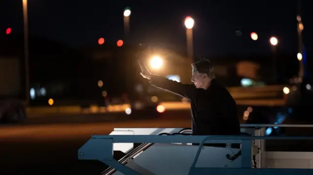 Anthony Blinken boarding plane.