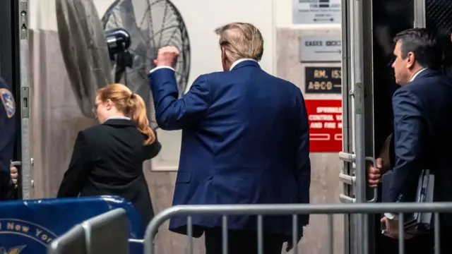 Trump exiting courtroom during break