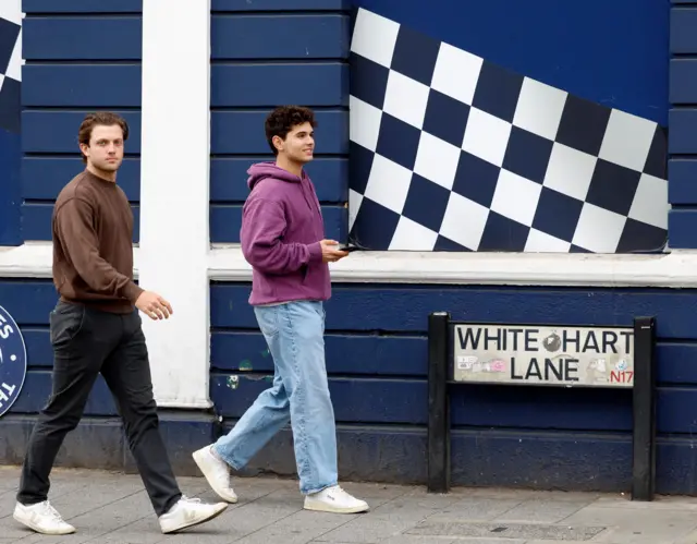 Fans walk down White Hart Lane