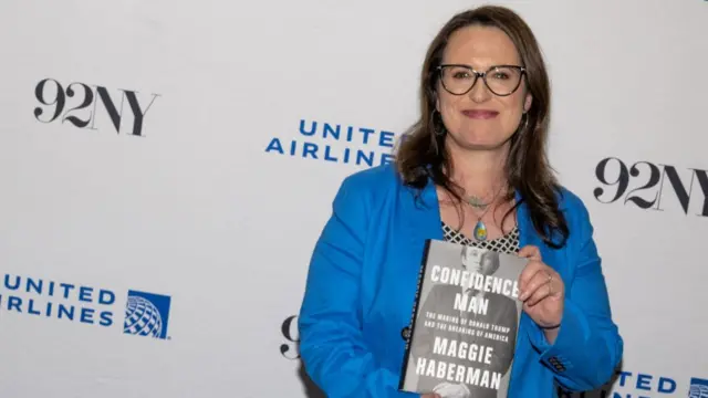 Maggie Haberman holds copy of her book