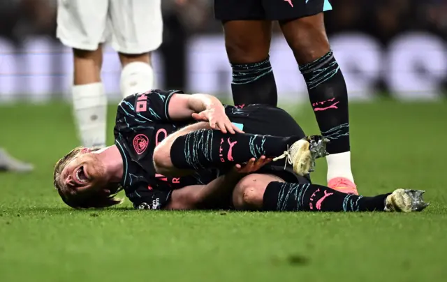 De Bruyne lies stricken after a bad foul