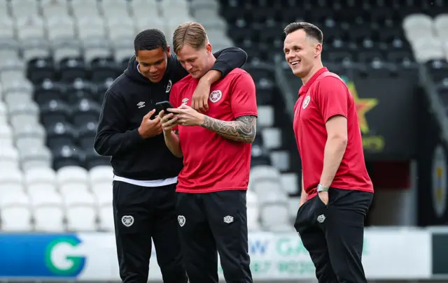 Hearts' Toby Sibbick, Frankie Kent and Lawrence Shankland pre-match during a cinch Premiership match between St Mirren and Heart of Midlothian at the SMiSA Stadium, on May 15, 2024, in Paisley, Scotland