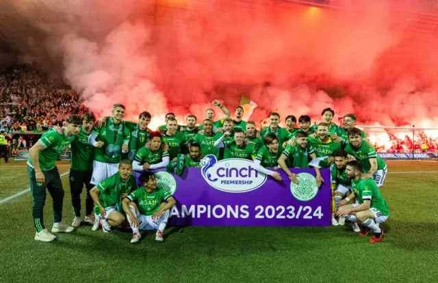 Celtic players celebrate their title success