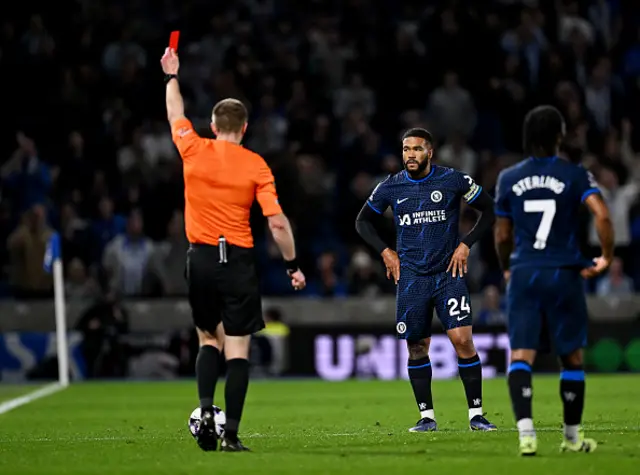 Reece James of Chelsea reacts after being shown a red card