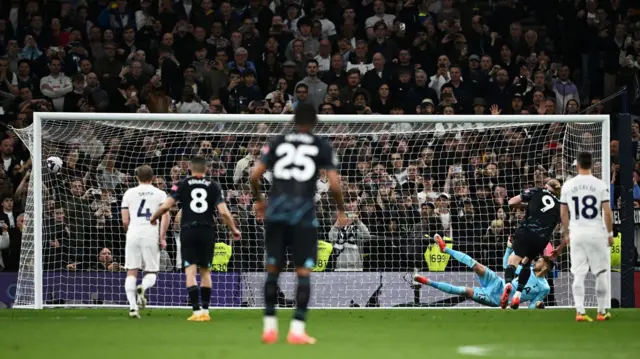 Manchester City's Erling Haaland scores a penalty against Tottenham