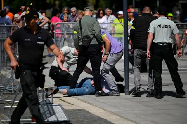 A person is detained after a shooting incident after Slovak government meeting in Handlova, Slovakia, May 15, 2024.