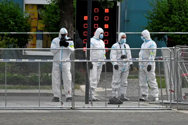 Members of the law enforcement work at the scene where Slovak Prime Minister Robert Fico was shot, in Handlova, SlovakiA