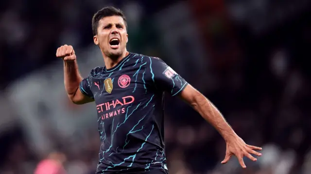 Rodri celebrates Manchester City's win at Tottenham