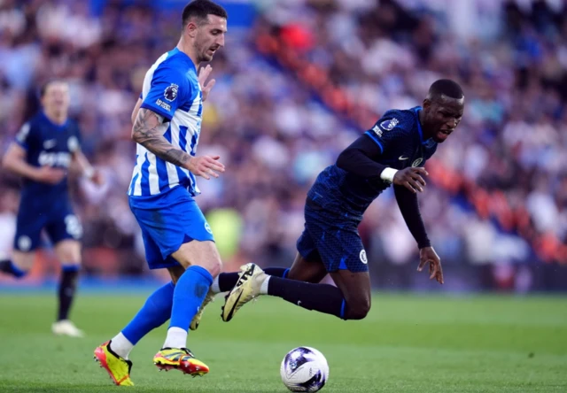 Nicolas Jackson and Brighton and Hove Albion's Lewis Dunk