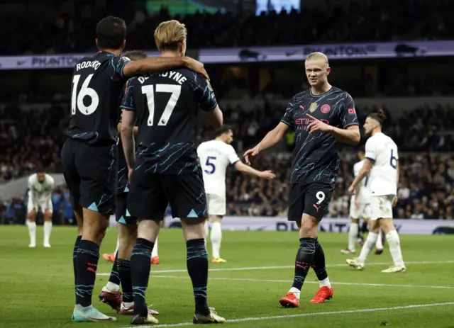 Kevin de Bruyne and Erling Haaland celebrate against Tottenham