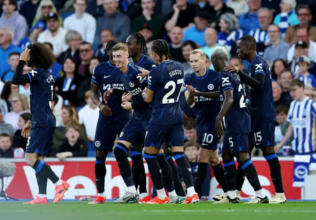 Cole Palmer of Chelsea celebrates scoring his team's first goal with teammates