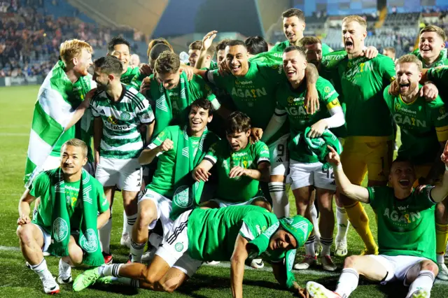 Celtic players celebrate after clinching the Scottish Premiership title