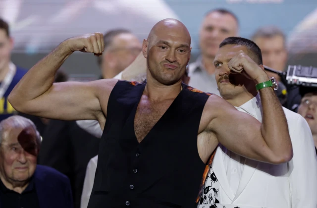 Tyson Fury flexes his muscles