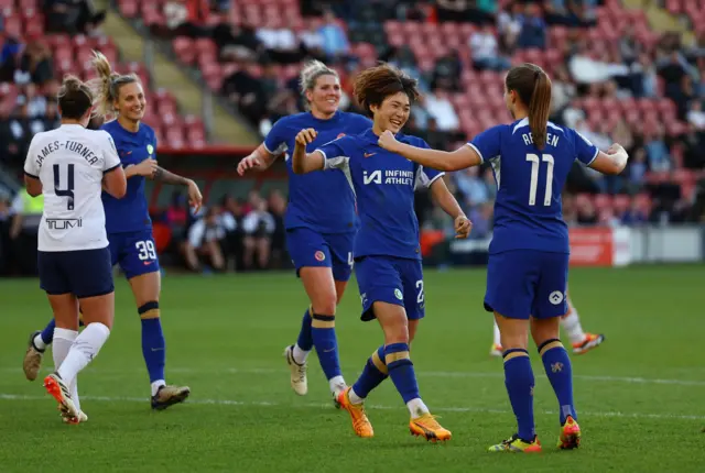 Chelsea players celebrate Maika Hamano's goal against Tottenham