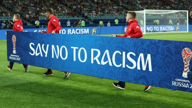 "Say no to racism" banner