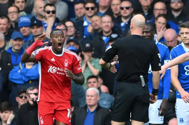 Callum Hudson-Odoi and Anthony Taylor