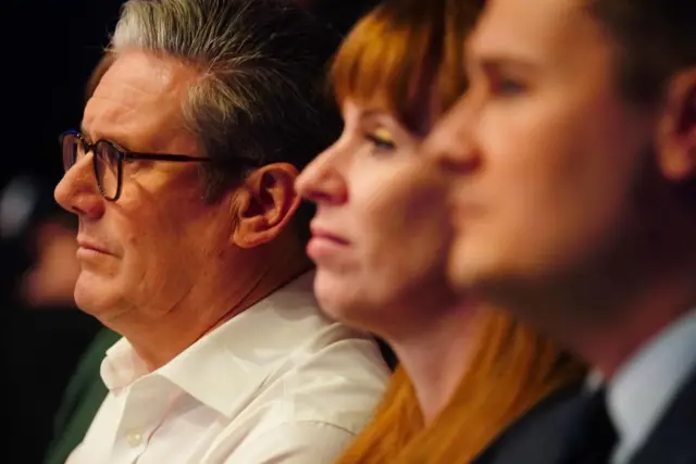 Keir Starmer, Angela Rayner, and Wes Streeting watch on