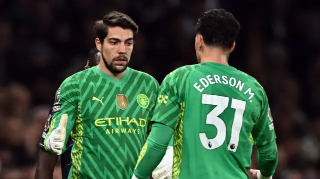 Manchester City goalkeeper Ederson is replaced by substitute Stefan Oretga