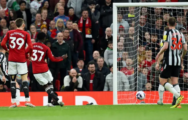 Manchester United's Kobbie Mainoo scores against Newcastle