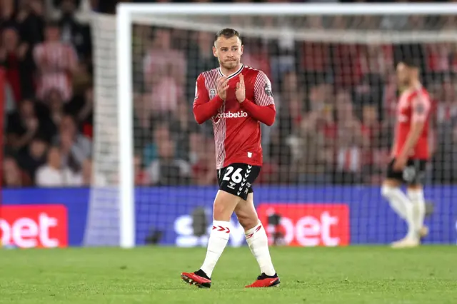 Ryan Fraser applauds the fans upon going off