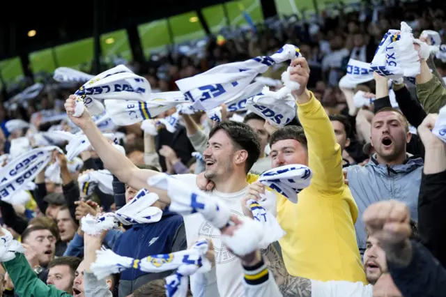 Leeds fans wave scarves during their play-off win over Norwich