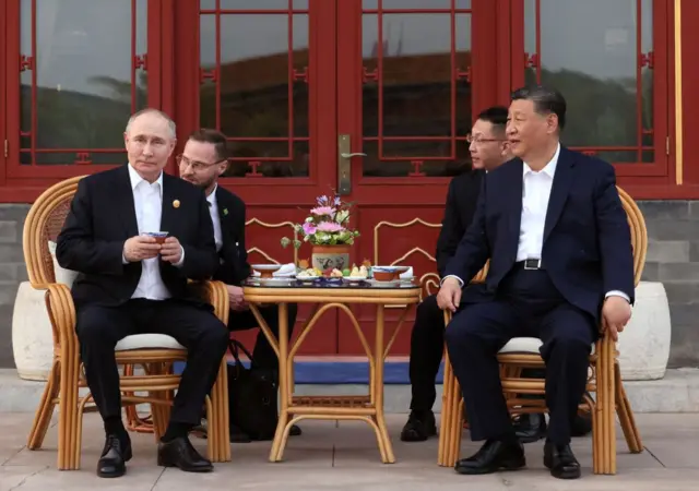 Xi and Putin sipping tea at Zhongnanhai; photo distributed by Russian state news agency Sputnik