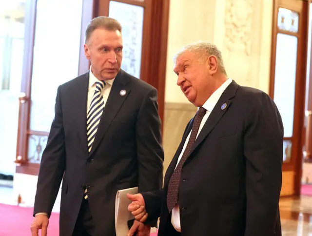 Russian businessman, Rosneft's President Igor Sechin (R) talks to VEB Corporation Director Igor Shuvalov as they attend Russian-Chinese talks on May 16, 2024 in Beijing, China. Russian President Putin is on a two-day visit to China.