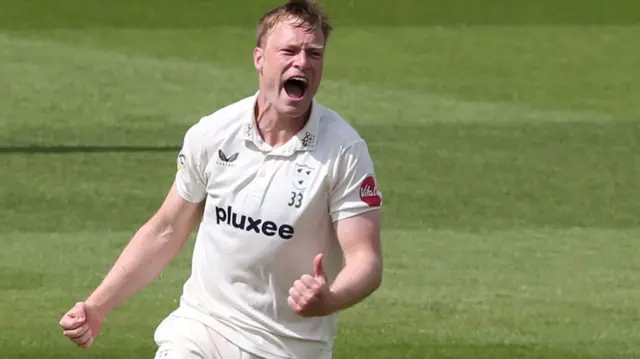 Matthew Waite celebrates taking wicket