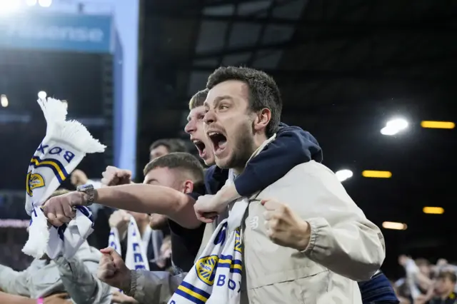 Leeds fans celebrate during their play-off win over Norwich