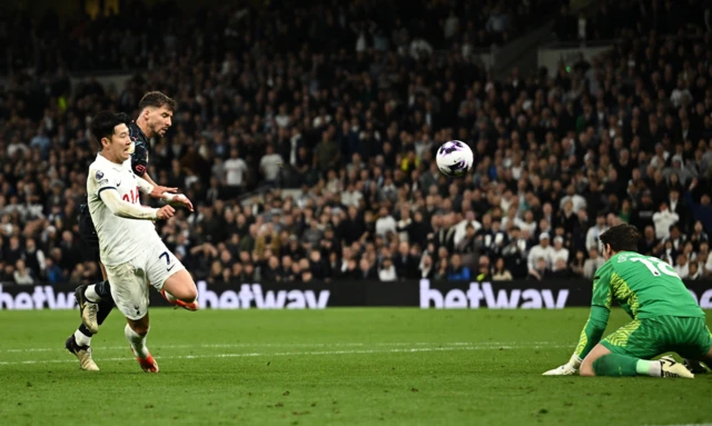 Manchester City goalkeeper Stefan Ortega saves from Tottenham's Stefan Ortega