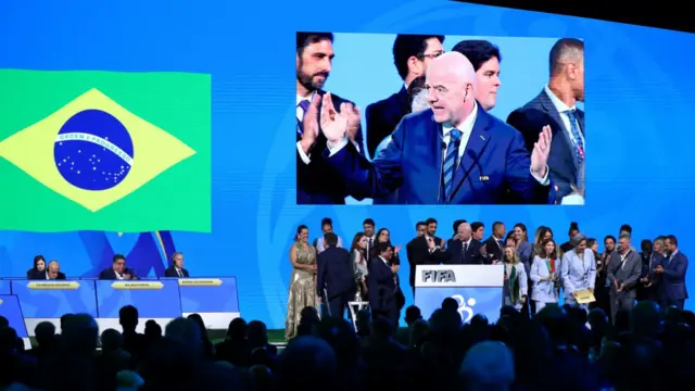 Fifa president Gianni Infantino with members of the Brazilian delegation after Brazil was named host of the 2027 Women's World Cup