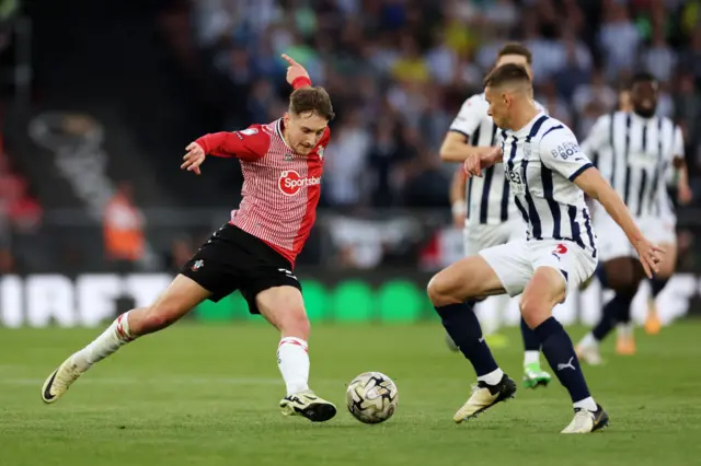 David Brooks of Southampton shoots whilst under pressure from Conor Townsend of West Bromwich Albion