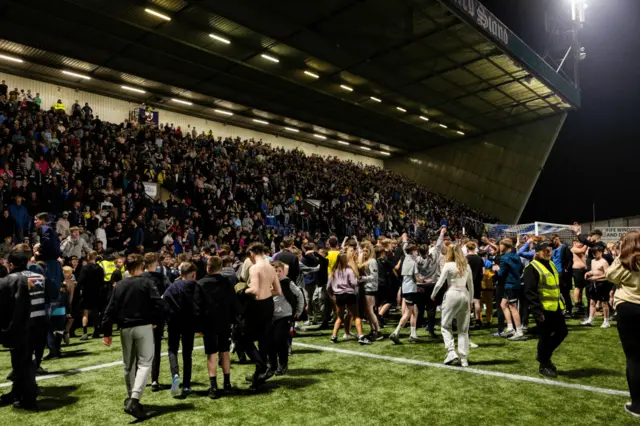 Raith fans invade the pitch after a cinch Premiership Play-Off Semi-Final 2nd Leg match between Raith Rovers and Partick Thistle at Starks Park, on May 17, 2024, in Kirkcaldy, Scotland.