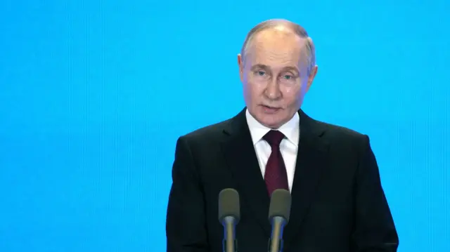 Russian President Vladimir Putin delivers a speech during the Russian-Chinese Expo