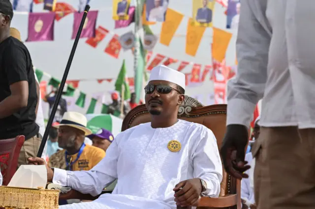 Chad's transitional president and presidential election candidate Mahamat Idriss Deby Itno, looks on during a final presidential election campaign rally at the place des nations in N'Djamena on May 4, 2024.