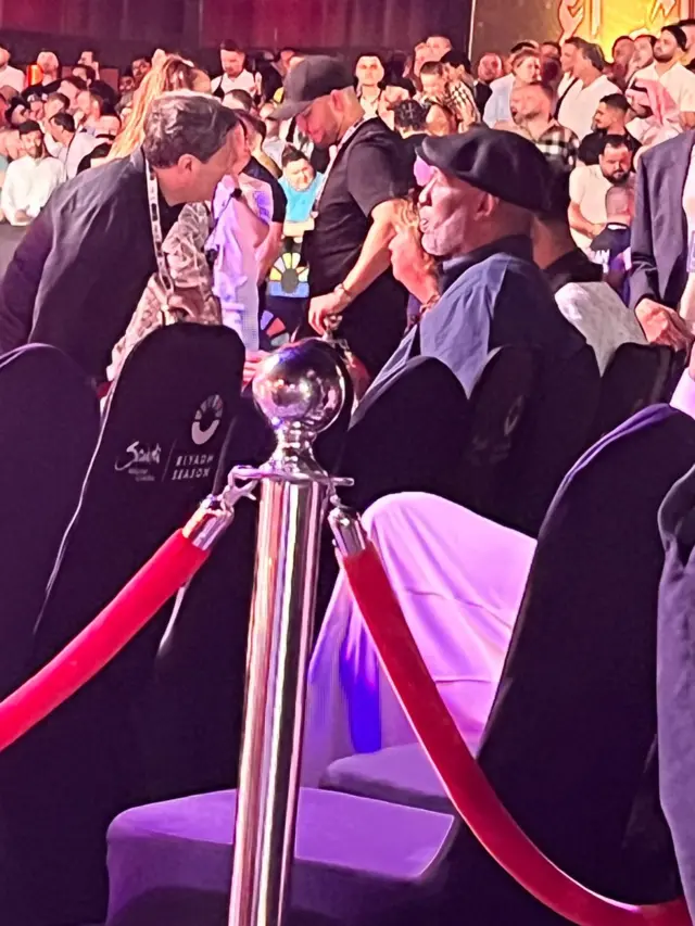 Lennox Lewis sat at the weigh-ins