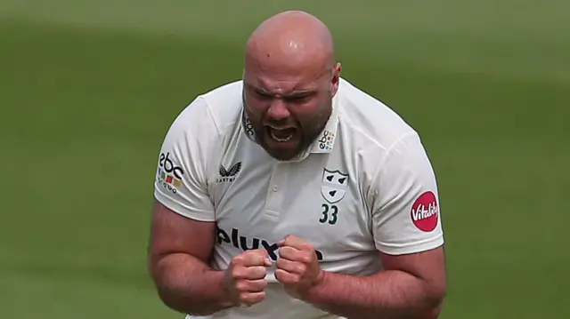 Joe Leach celebrates taking wicket