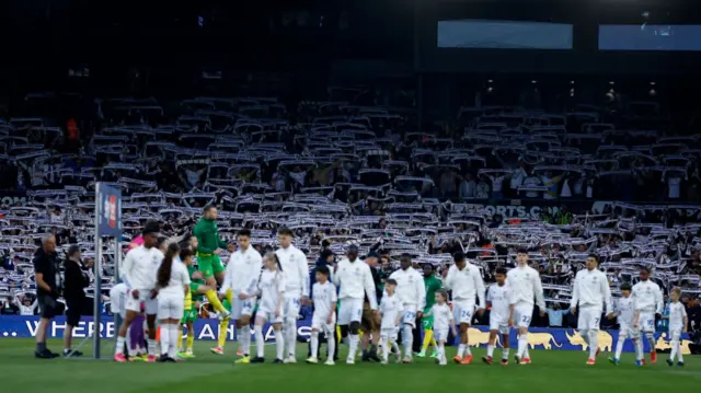 Leeds players walk on to the field before their play-off win over Norwich