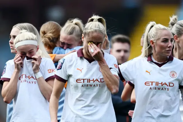 Man City players look dejected