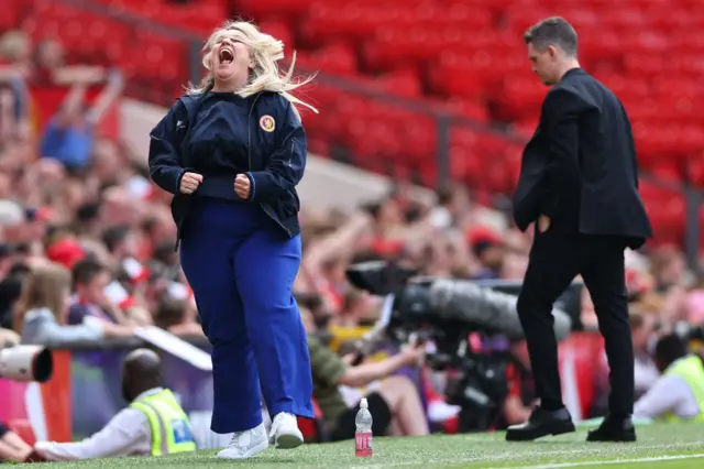 Emma Hayes the head coach / manager of Chelsea Women celebrates during the Barclays Women's Super League match between Manchester United and Chelsea FC at Old Trafford