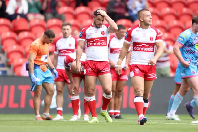 Hull KR players look dejected during their game against Wigan