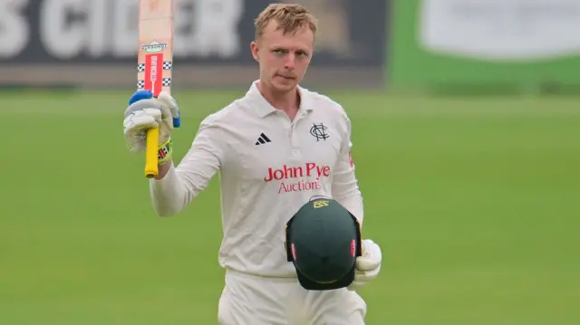 Lyndon James celebrates scoring a century