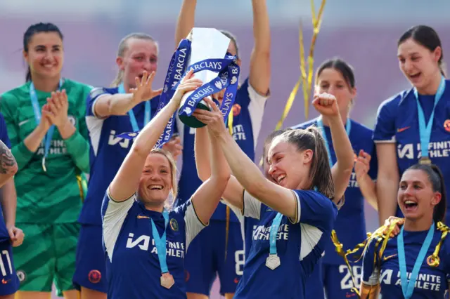 Naimh Charles and Erin Cuthbert lift WSL trophy