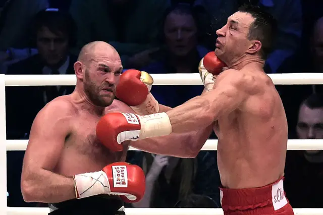 Tyson Fury lands an uppercut punch on Wladimir Klitschko