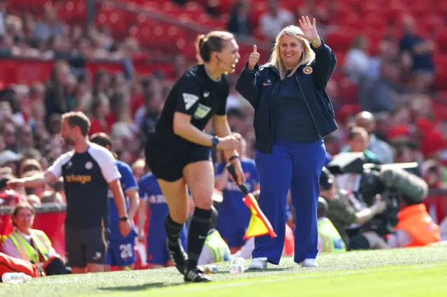 Emma Hayes the head coach / manager of Chelsea Women responds to the fans during the Barclays Women's Super League match between Manchester United and Chelsea FC