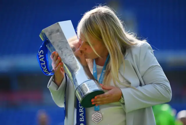 Emma Hayes kisses WSL trophy