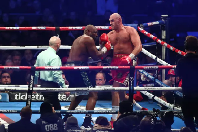 Tyson Fury hits Derek Chisora with an uppercut