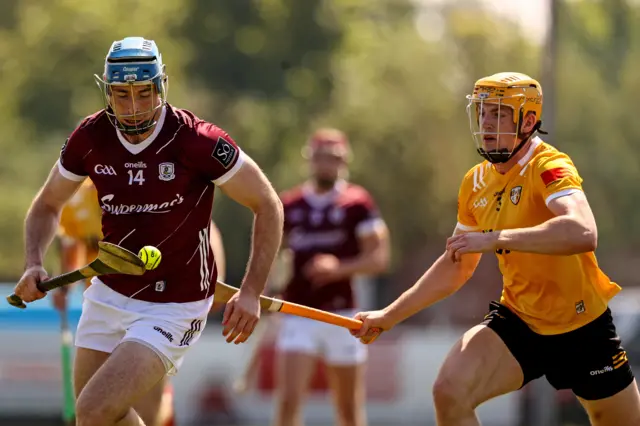 Galway's Conor Cooney with Antrim's Niall O'Connor