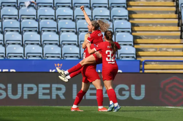 Leanne Kiernan of Liverpool celebrates scoring her team's second goal with teammates during the Barclays Women´s Super League match between Leicester City and Liverpool FC